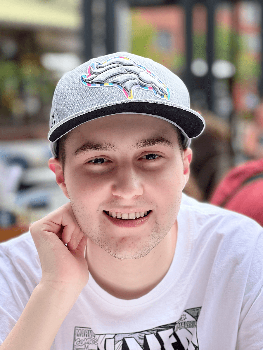 Jack wearing a Broncos hat, candid